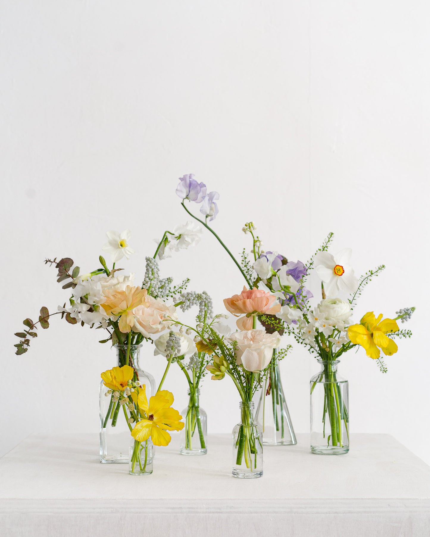 Scatter of Bud Vases