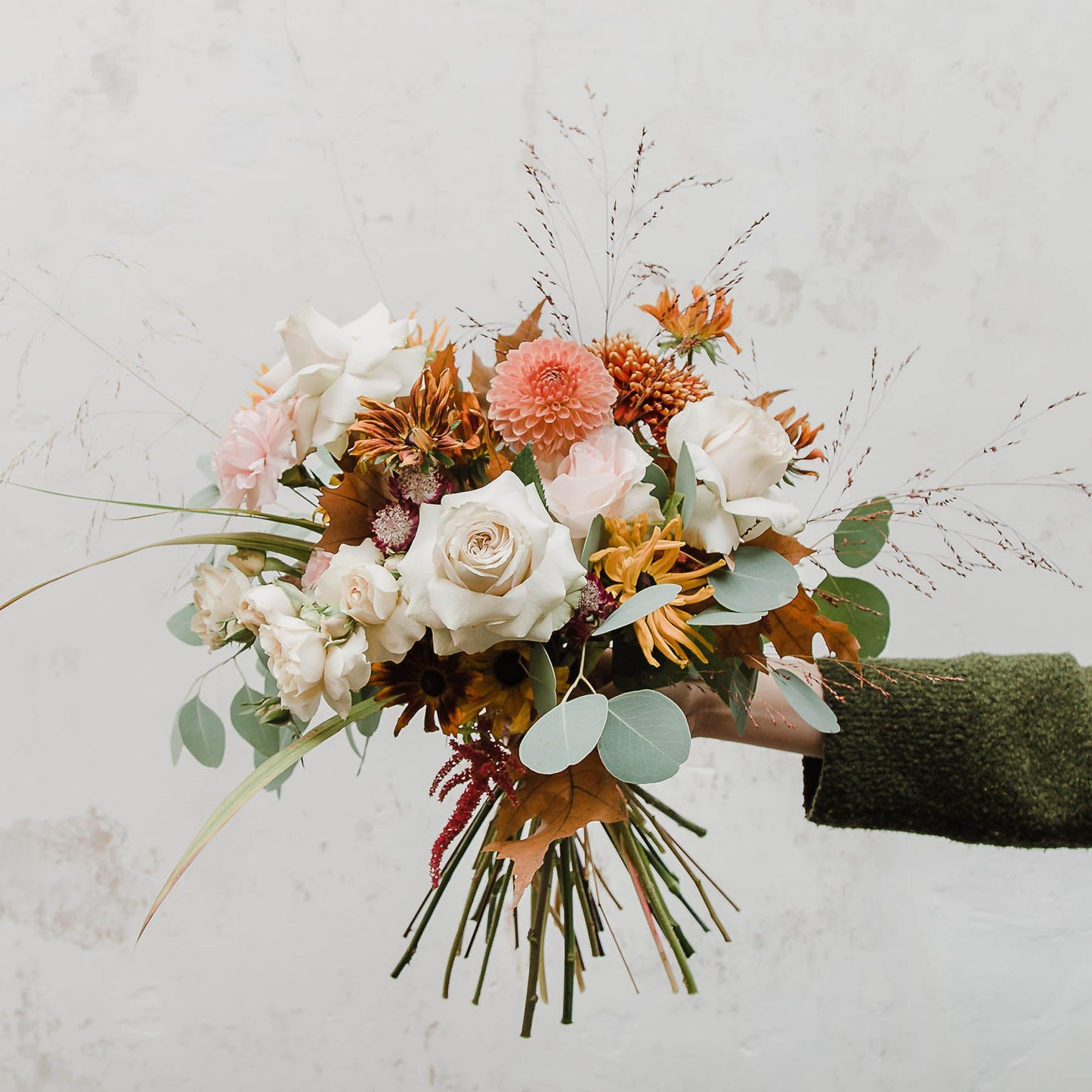 A beautiful seasonal bouquet with a soft palette, lots of delicate petals and large roses from Edinburgh Florist Aspen Florals