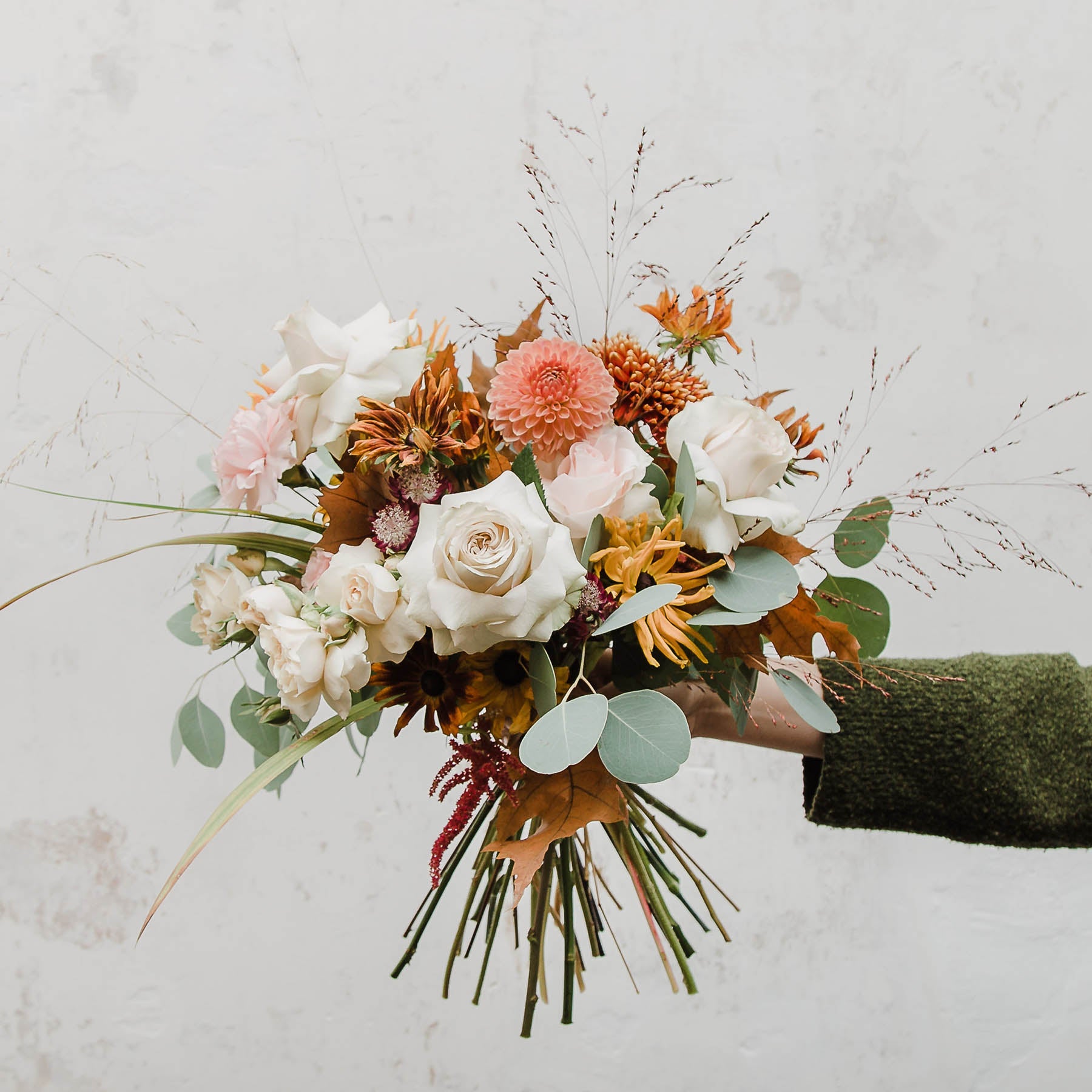 A beautiful seasonal bouquet with a soft palette, lots of delicate petals and large roses from Edinburgh Florist Aspen Florals