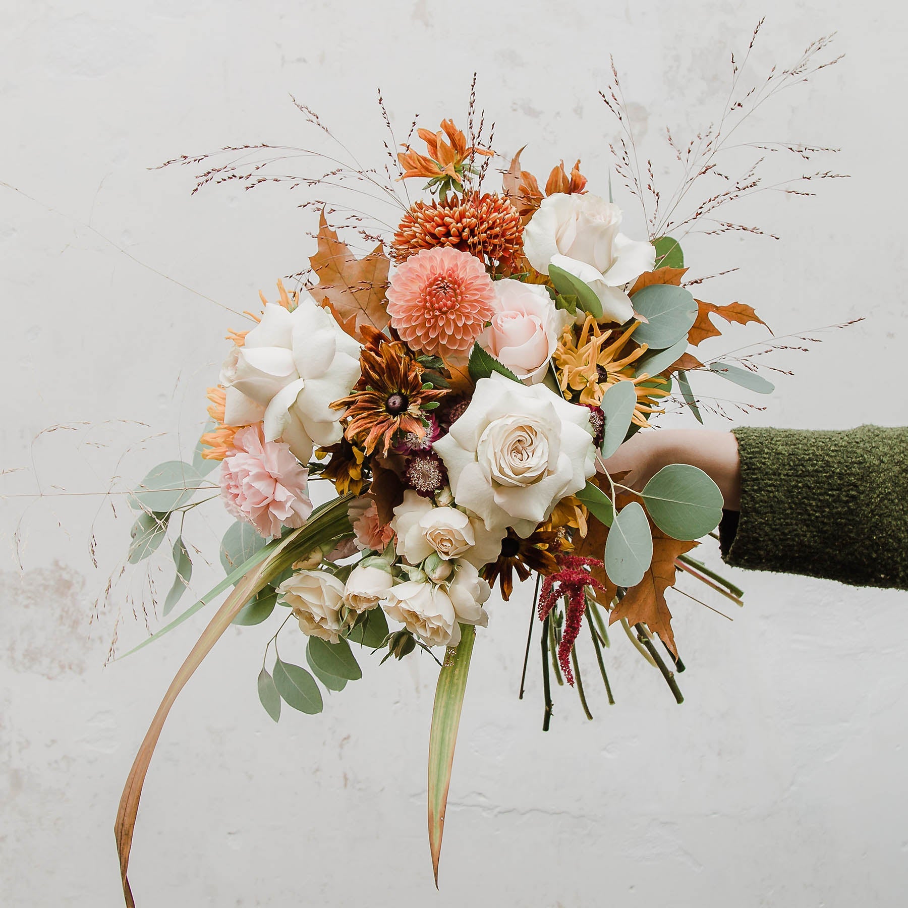 A beautiful seasonal bouquet of pretty flowers and eucalyptus and mix foliage and grasses from Edinburgh Florist