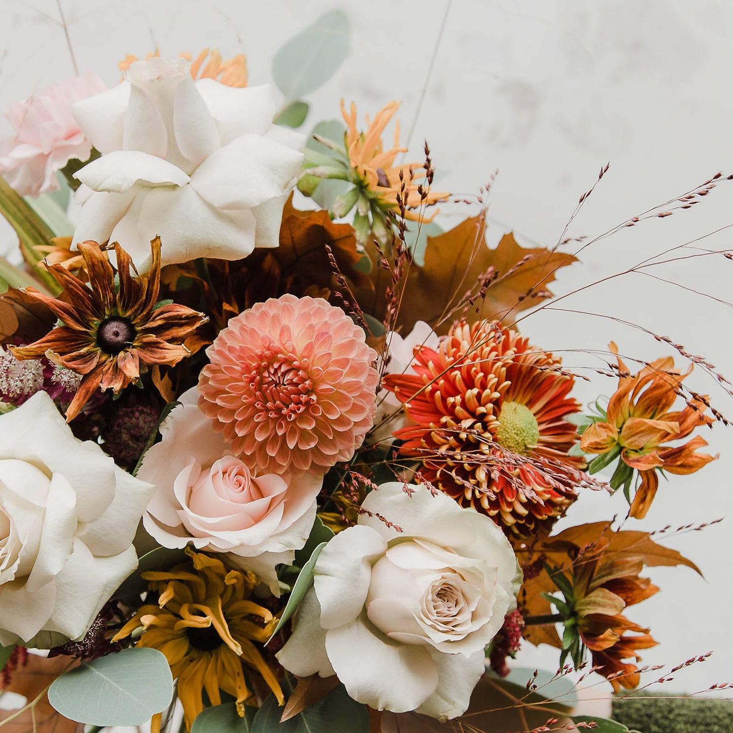 showing floristry detail of this beautiful seasonal bouquet with a soft autumn palette, lots of delicate petals and large roses from Edinburgh Florist Aspen Florals