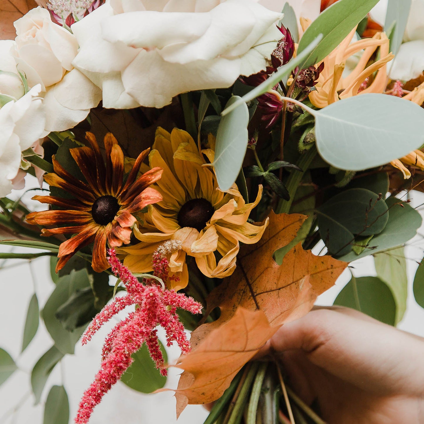 This beautiful seasonal bouquet with a soft autumn palette, dahlias, sunflowers, rudbeckias and large roses from Edinburgh Florist Aspen Florals