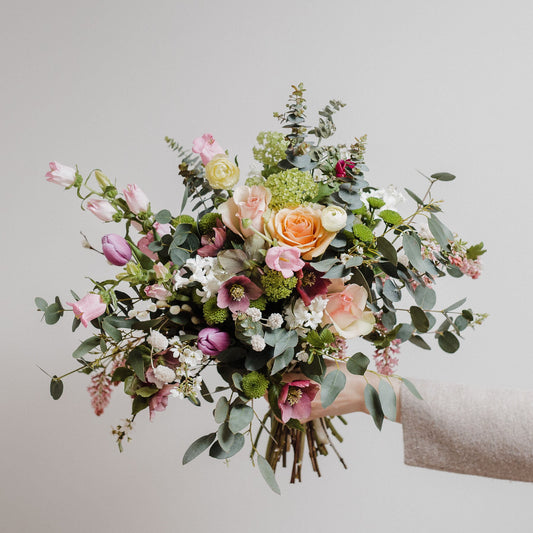beautiful seasonal luxury blooms, posies and hand tied bouquets featuring a spring bouquet mix with hellebores, viburnum, ranunculus, hyacinth and tulips from Broughton Street florist Aspen Florals
